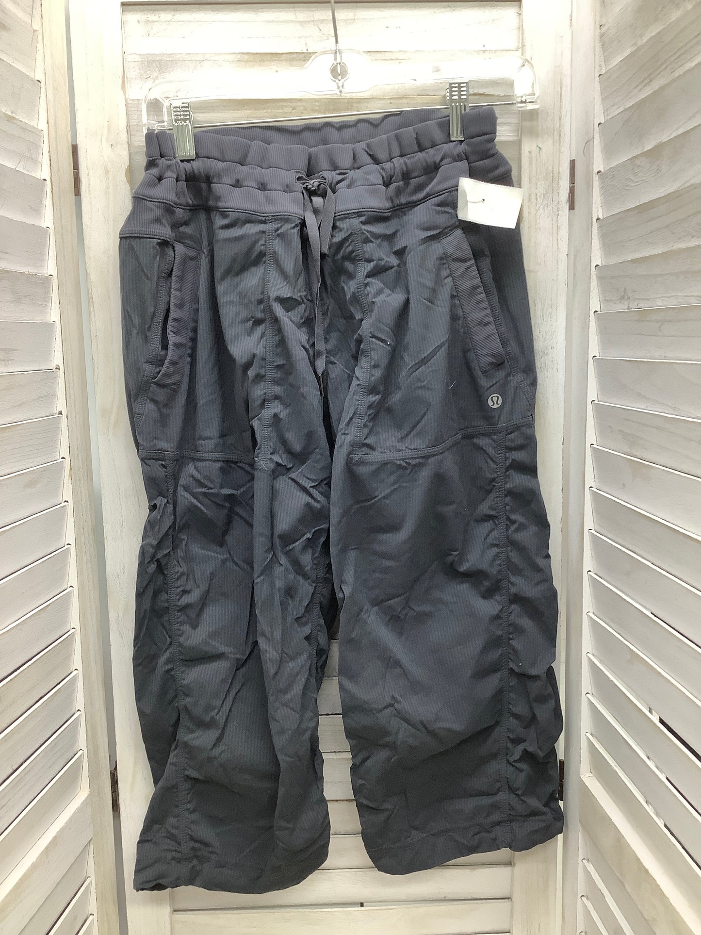 Athletic Capris By Lululemon In Grey, Size: 8